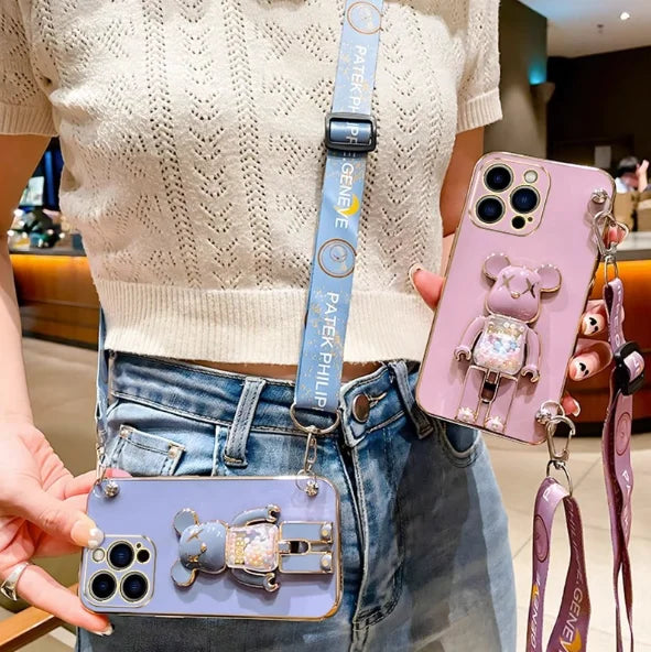 Luxus 3D Bärenhalterung Crossbody Armband mit Riemen & Lanyard iPhone Hülle | MagSafe Case mit Rundumschutz und Kameralinsenschutzabdeckung für Apple iPhone 17/17 Air, 16/16e, 15, 14, 13 Pro Max Plus Cover | Panzertasche Handyhülle | Premium Schutzhülle